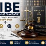 AIBE All India Bar Examination preparation image featuring Constitution of India, law books, gavel, scales of justice, and important legal study materials.