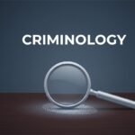 Conceptual illustration of a magnifying glass and fingerprint representing criminology and criminal justice